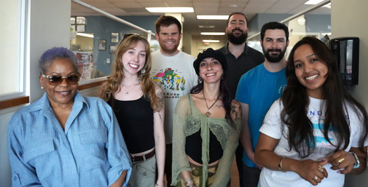 Group of smiling Elliot House employees